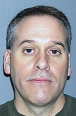 Clark Allan Roberts, 46, charged with conspiring to steal trade secrets from Goodyear Tire & Rubber Co. 