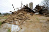 A 90-year-old barn on Bobby Anderson's cattle farm in Greenback, Tenn., seen here Thursday, March 24, 2011, was destroyed by a storm that passed through the area Wednesday night.