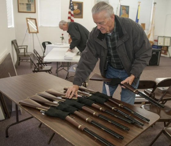 photos by J. MILES CARY/NEWS SENTINEL
Loudon County Veterans Honor Guard member Russ Heimforth unpacks new rifles Monday at the Lenoir City War Memorial Building. The Henry Repeating Rifle Co. donated seven lever-action rifles to be used by the honor guard for conducting salutes at military funerals. The new .22-caliber guns will replace World War II-era M1 Garand rifles the honor guard has been using for more than 60 years.
